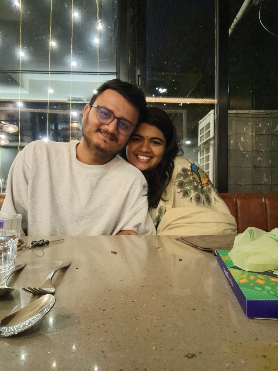 The two of them at a dinner table