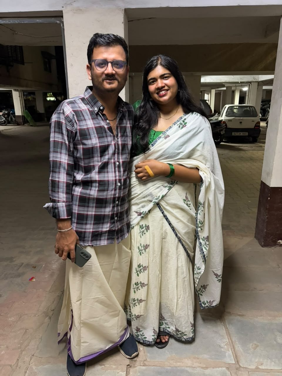 The couple together in Kerala kasavu attire